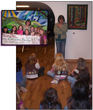 Betty receives a check for $250 from a local Brownie troop, 3/26/09